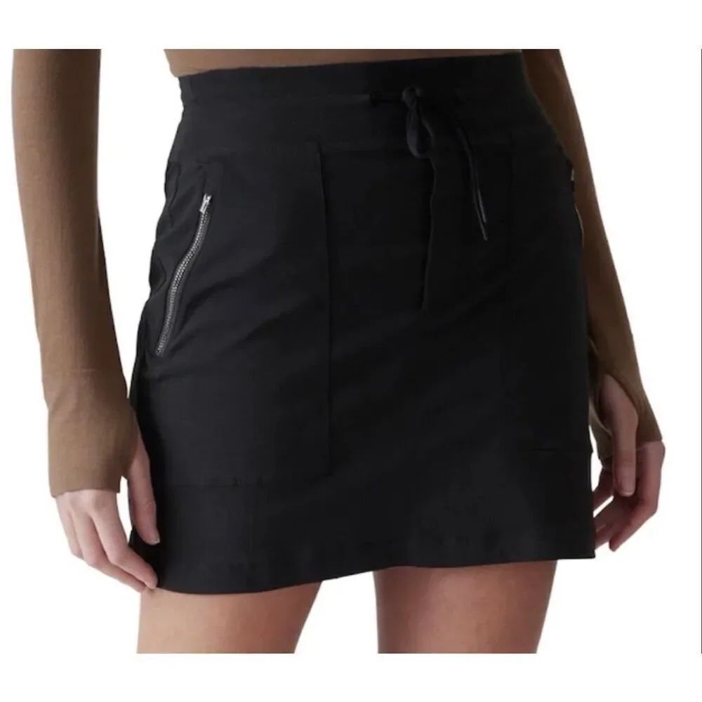 Athleta TREKKIE MID RISE black Sport Skirt Skort sz 4